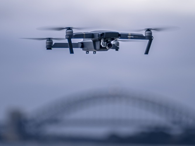 DJI Drone hovering near sydney harbour bridge